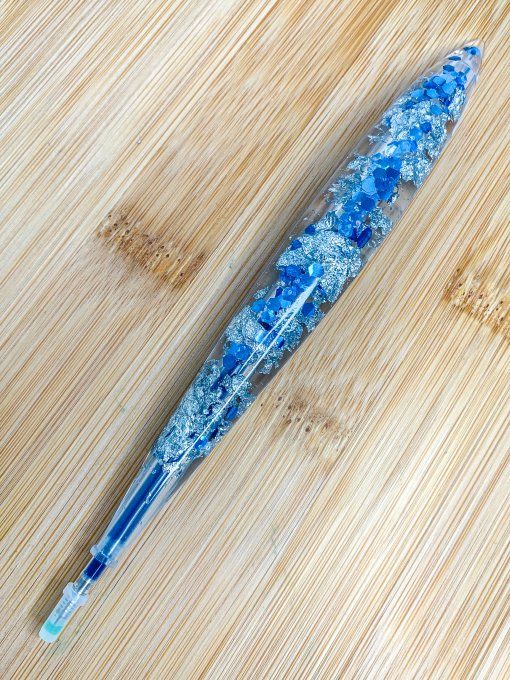 Stylo "rechargeable" ovale paillettes bleues et feuilles argent 