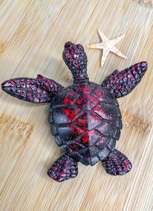 Tortue noire paillettes rouge